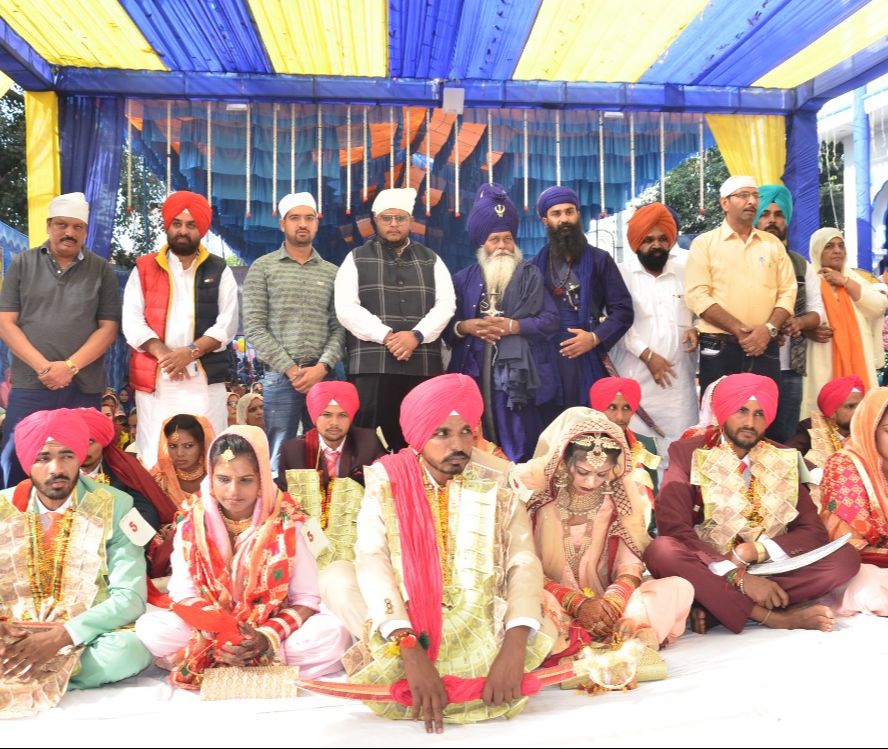 Mass Marriages: 29 couples tie the knot in Tarn Taran