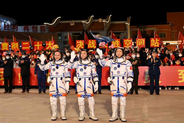 China successfully launches three astronauts for its space station