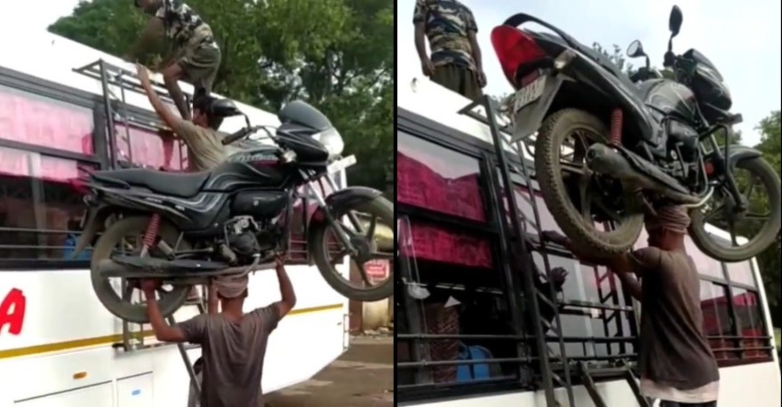 Viral video: Man impeccably climbs up ladder onto bus while balancing motorcycle on his head, netizens call him ‘superhuman’