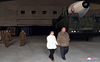 North Korea unveils Kim’s daughter at missile launch site