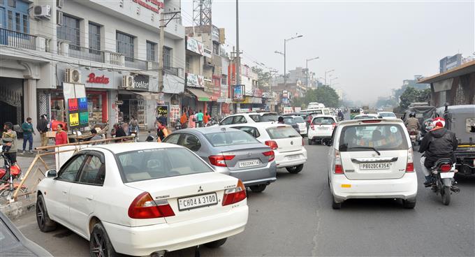 Haphazard parking on city roads leading to traffic jams