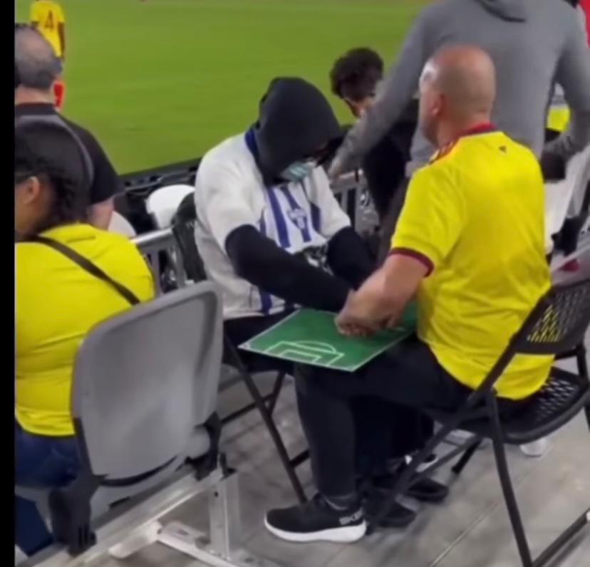 Heartwarming: Man helps blind friend experience live football match