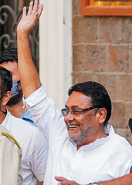 Maharashtra minister Nawab Malik held under PMLA