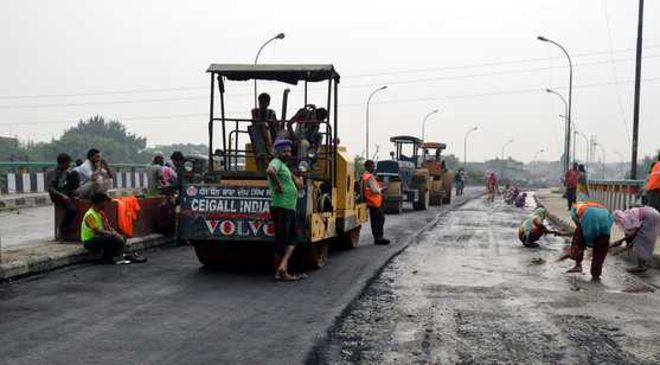 Issues resolved, road work gathers pace