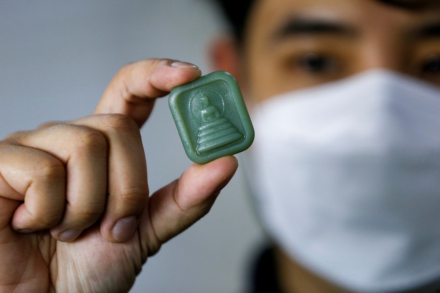 Thais make amulets from plastic waste to inspire more recycling