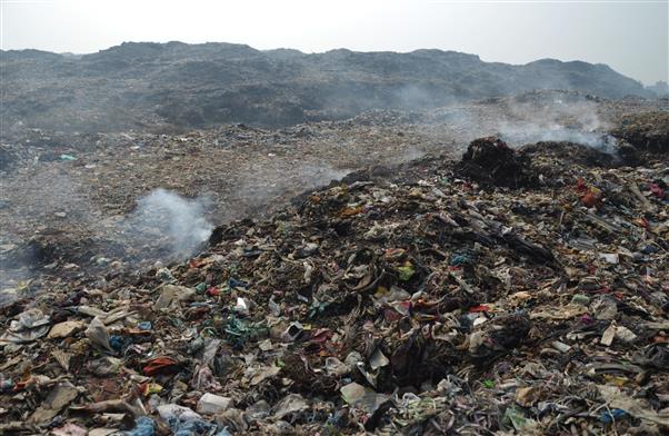 Environment activists raise concern over garbage piles at dump near Kakka village