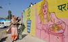 Paintings with messages of clean  environs to spruce up walls in city