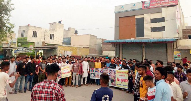 Sports lovers hold protest, seek action in Sandeep Nangal case