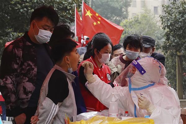 China battles fresh Covid outbreak