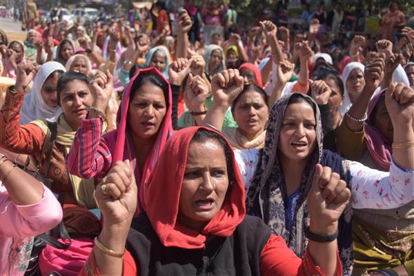 On Women's Day, Aanganwari workers hold protest in Ludhiana, burn effigy of Central Govt