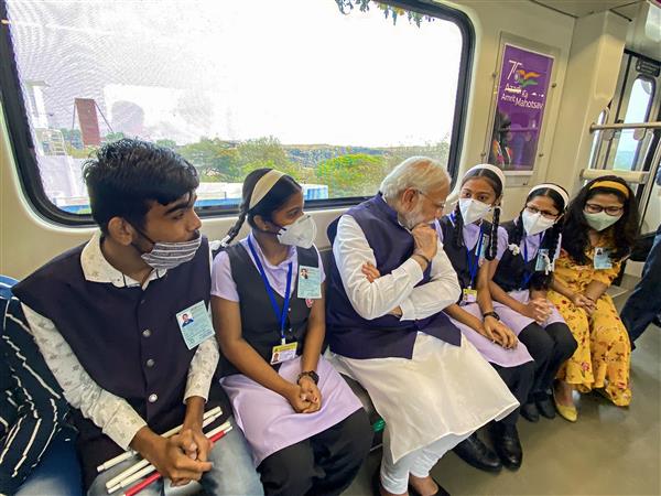 PM Modi inaugurates Pune Metro, takes a ride with school students