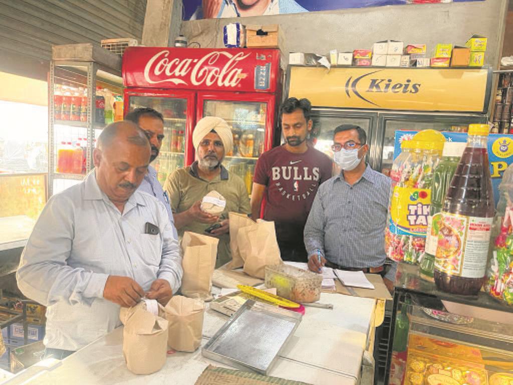Health team collects samples of milk products in district