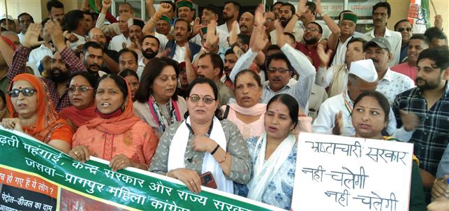 Congress activists protest rising fuel prices in Dharamsala