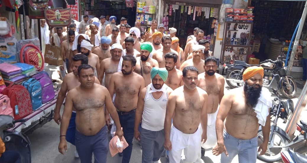 Farmers protest shirtless in Ambala, demand sugarcane dues