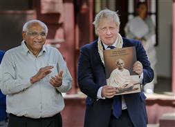 In new pacts with India, British PM Johnson speaks of creating 11,000 jobs across the UK