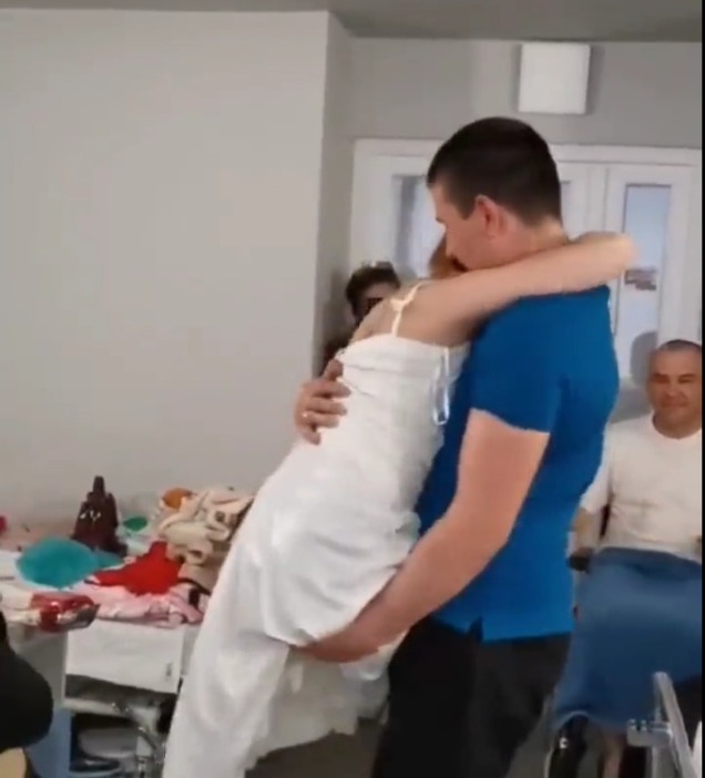 Nuptial bliss: Ukrainian nurse, who got her legs and fingers amputated after landmine blast, shares first dance after being married