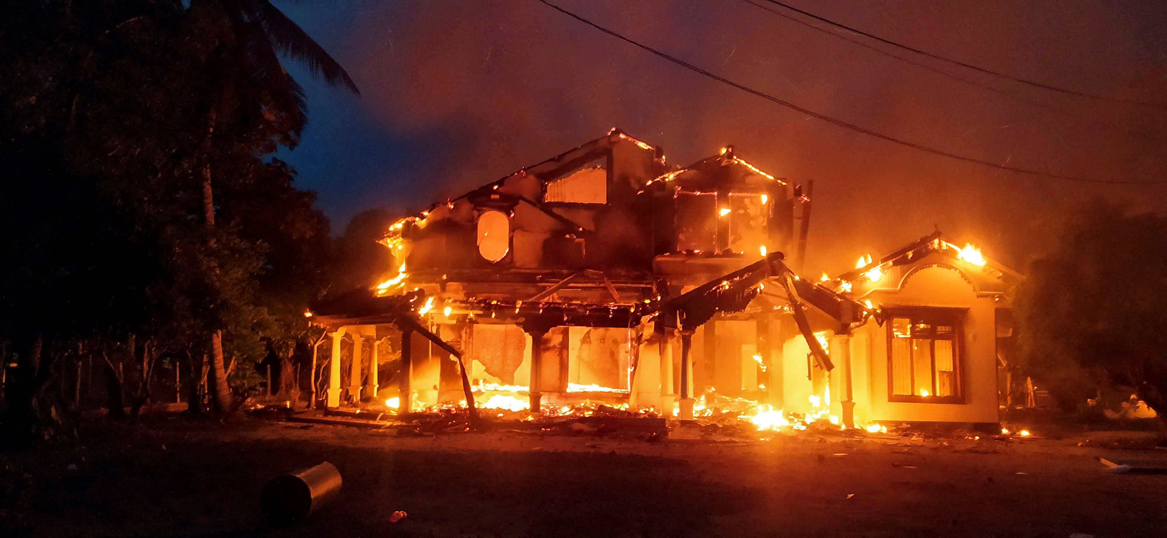 Lankan PM quits, Rajapaksas' family house set afire; army out