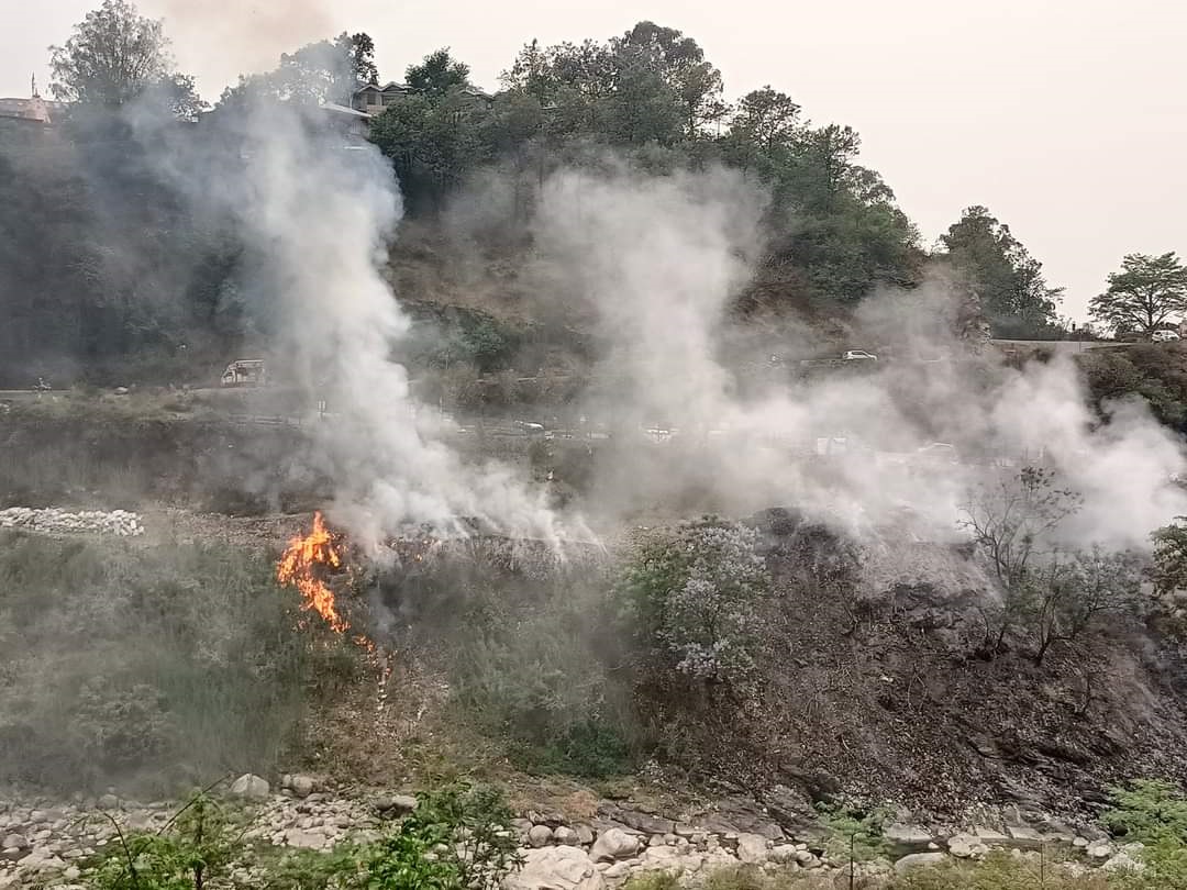 Garbage being burnt on river banks