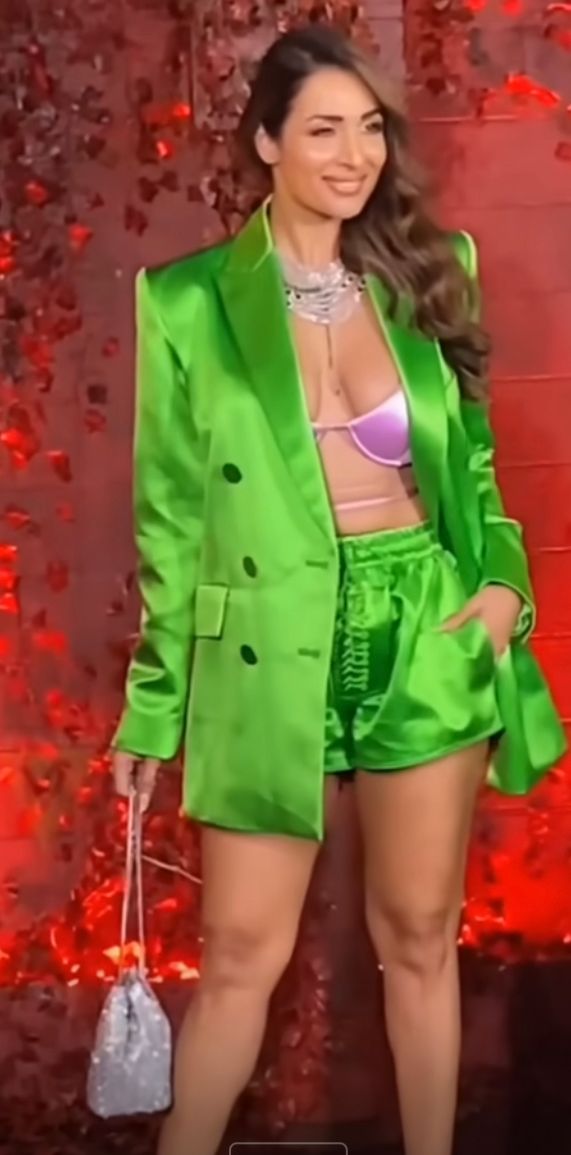 ‘Why dressed up like parrot’: Malaika Arora gets brutally trolled for wearing neon green jacket-shorts at Karan Johar’s party
