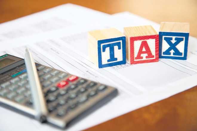 SGST raids 4 firms for tax evasion