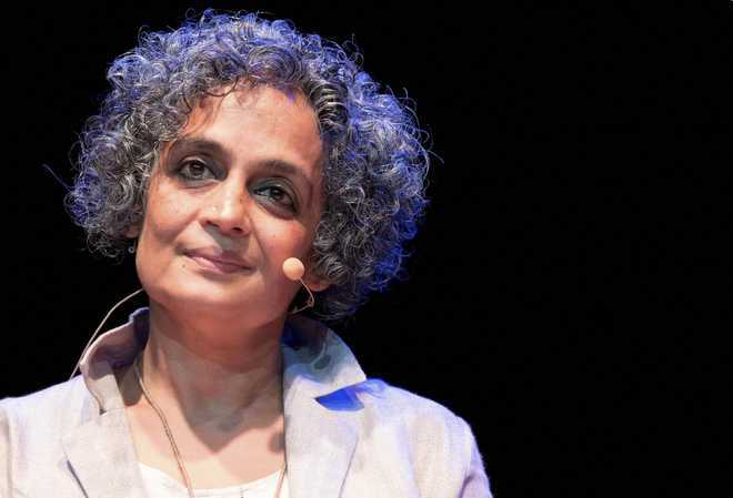 Today's India like a plane flying backwards, it's headed for crash: Arundhati Roy