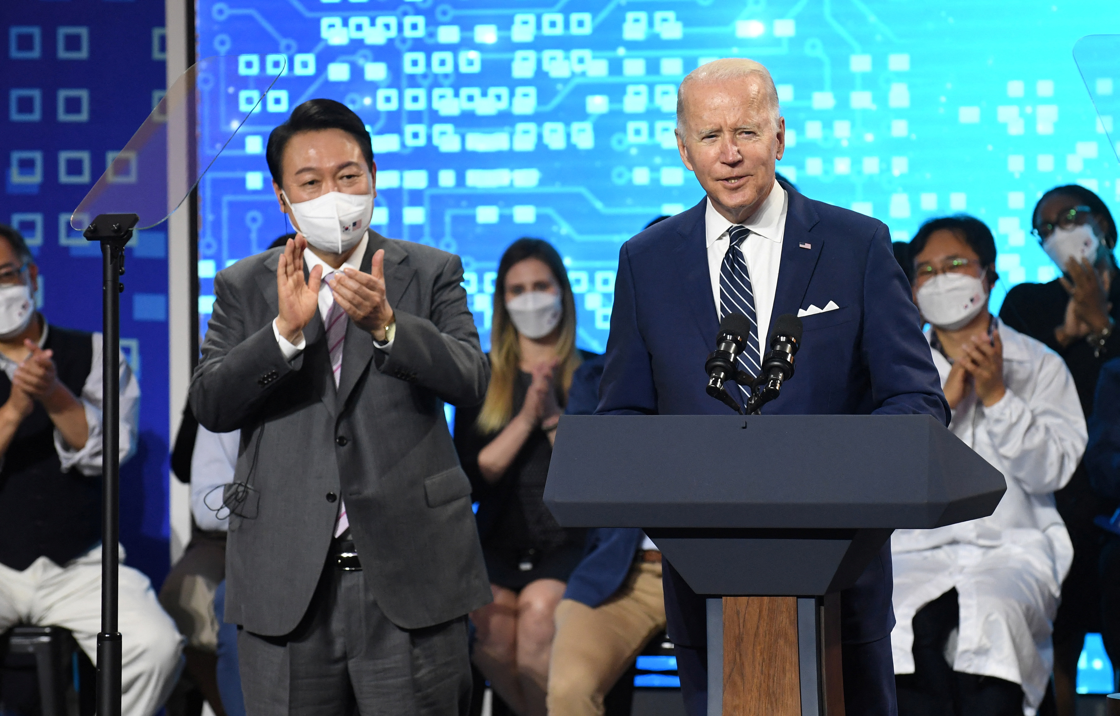 Joe Biden lands in Asia, Beijing launches South China Sea drills