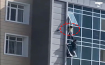 Video: Man hailed a hero for risking own life to save 3-year-old girl hanging from eighth floor window