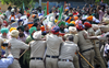 Protesting farmers denied entry into Chandigarh, squat at Mohali border