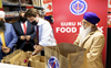 Canada PM Justin Trudeau lends a hand at Surrey’s Guru Nanak Food Bank; extends gratitude to volunteers