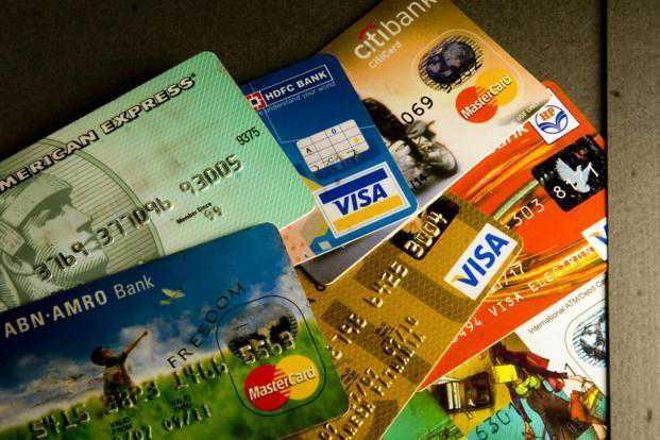 Two fraudsters held with 58 ATM cards