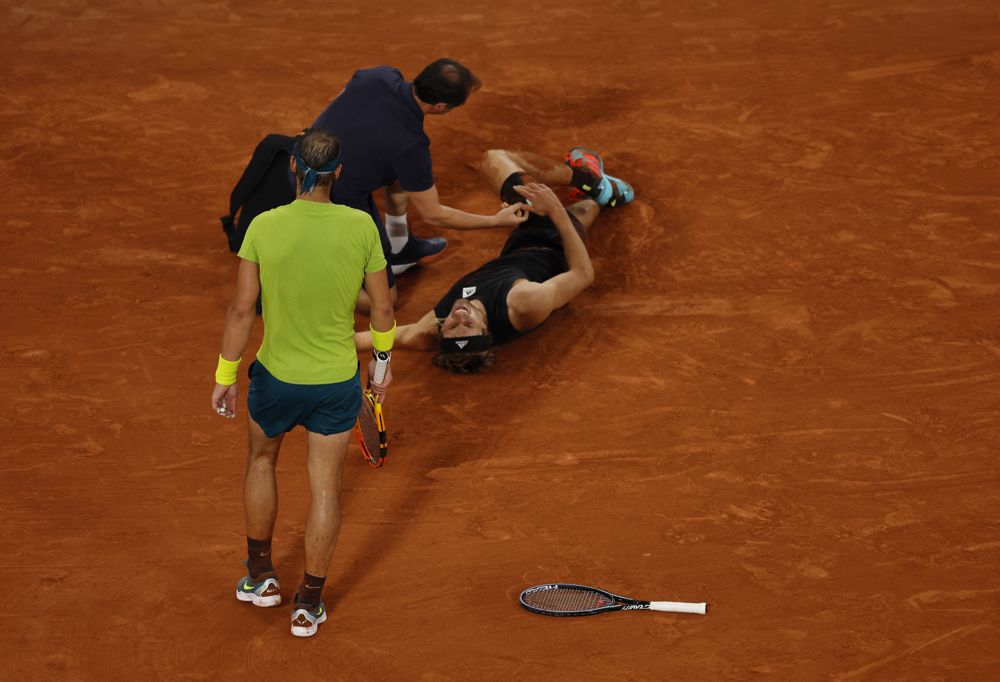 Alexander Zverev’s twisted ankle allows Rafael Nadal to walk on into final