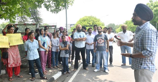 Students protest fee hike, merger of 6 departments at Panjab University