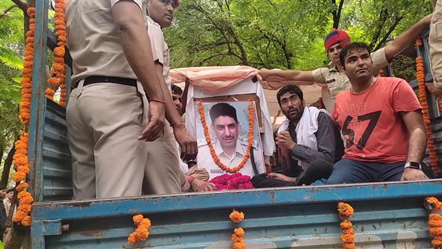 Slain Haryana DSP laid to rest with state honours at his native village