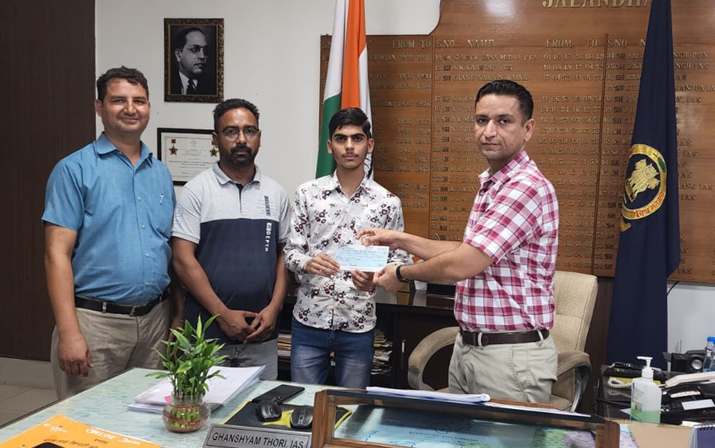 Jalandhar DC felicitates son of domestic help who topped Class XII