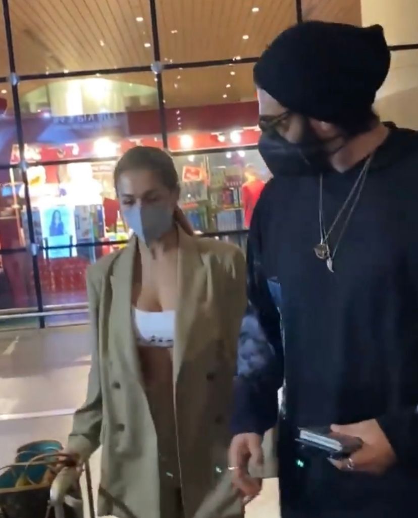 Malaika Arora brutally trolled for wearing oversized jacket with a bustier top at airport