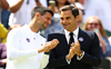 Federer hints at Wimbledon comeback on surprise visit