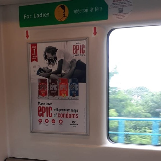 Netizens at loggerheads over condom ad displayed above women’s seat in Delhi Metro