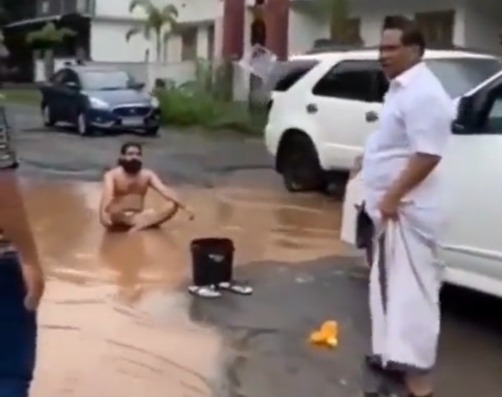 Man drenches self in water-logged pothole in protest against dire condition of road, performs yoga before local MLA