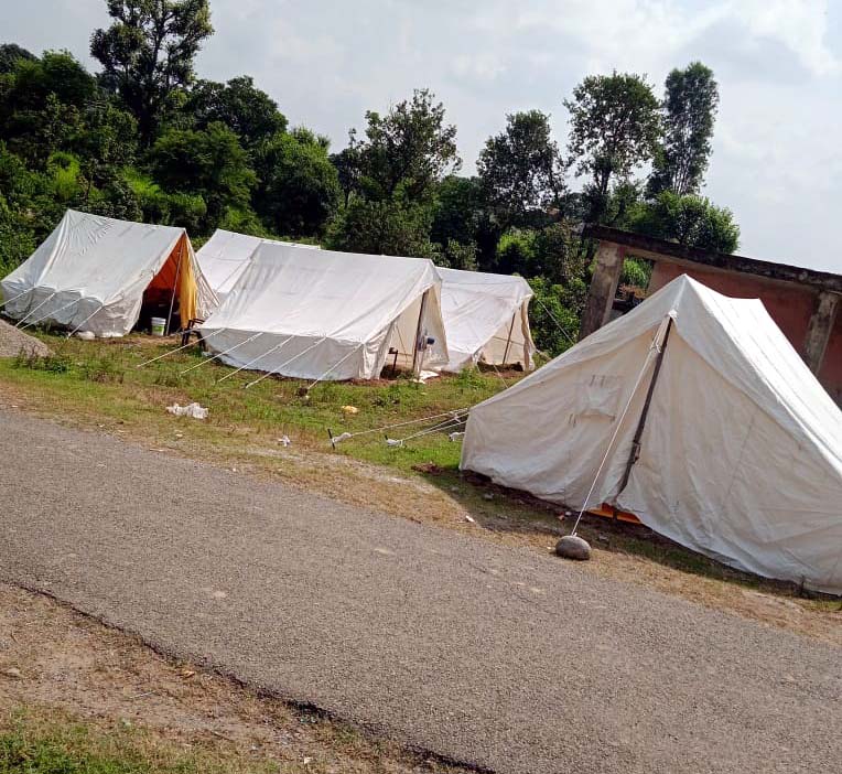 Nurpur: Houses damaged after massive land sinking, families spend nights in tents