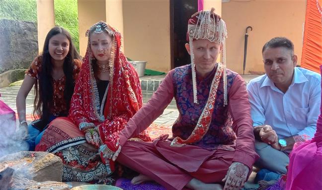 Russian boy weds Ukraine girl with Hindu traditions in Dharamsala