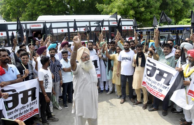 Pvt bus operators protest in Bathinda, seek tax waiver to make up for losses
