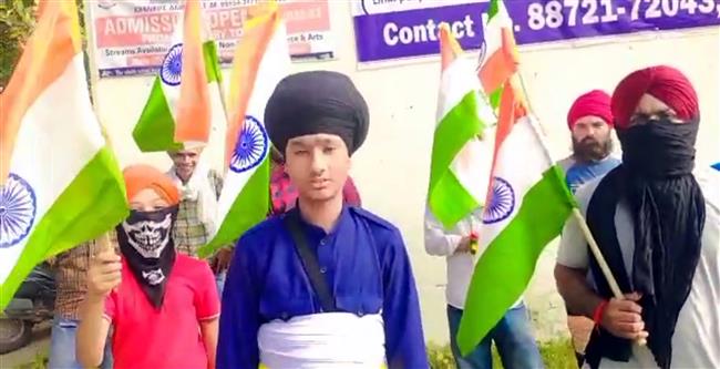 Youths raise slogans, wave Tricolour at Gurpatwant Singh Pannu's village