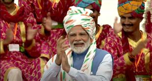 PM Modi wears white safa with tricolour stripes, long trail on 76th Independence Day