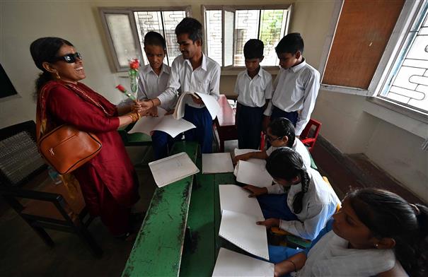 Visually impaired teacher with a vision