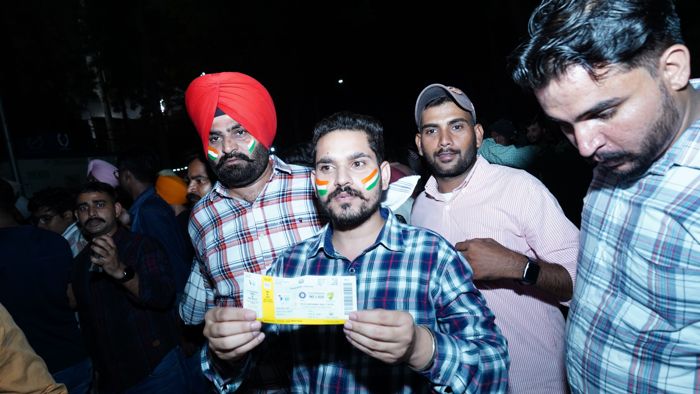 Tickets in hand, fans wait outside full stadium in Mohali