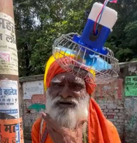 'IITian Baba': Old man mounts fan, solar panel over head to evade heat, netizens fascinated