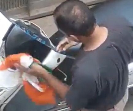 Watch: Video of man cleaning scooty with national flag draws social media ire, netizens demand action