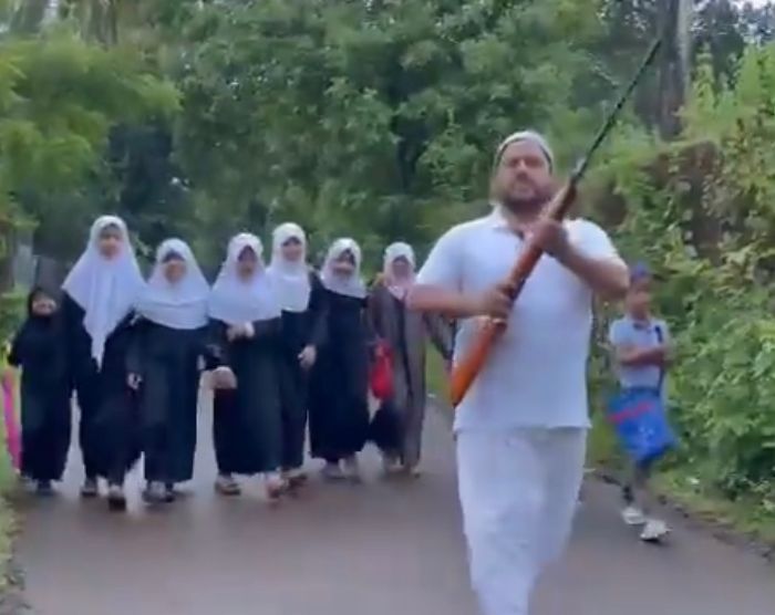 Father carries gun to school as he escorts kids amid rising incidents of stray dog attack in Kerala