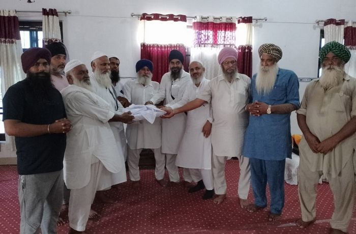 Kept in gurdwara for 75 yrs, Quran handed over to mosque