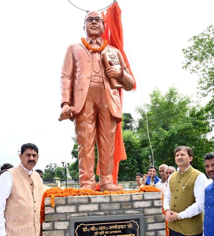 MP Dr Sikander Kumar unveils Ambedkar’s statue near Nurpur, lays stone of library